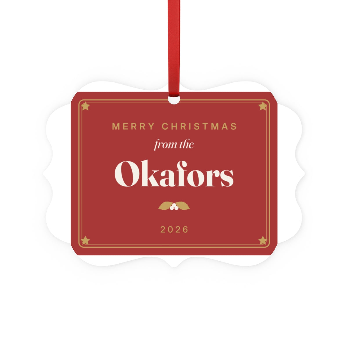 Family aluminium plaque ornament mock-up in red and gold with a ribbon, 'Merry Christmas from the Okafors' and '2026'