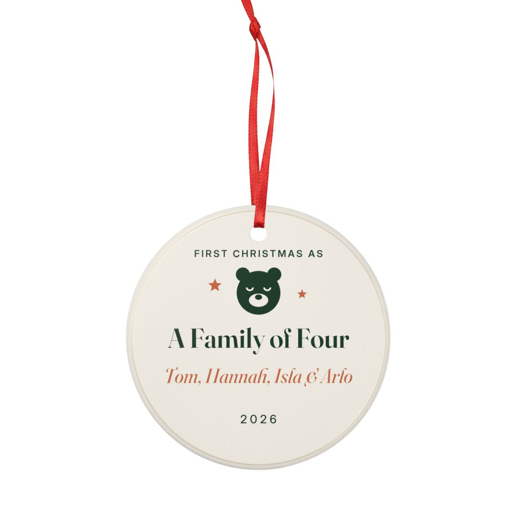Personalised first Christmas as a family ornament mock-up hanging on its red ribbon, 'Tom, Hannah, Isla & Arlo' visible
