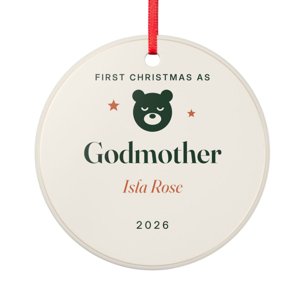 Personalised first Christmas as godparents ornament mock-up, round ceramic with a bear, 'Godmother', 'Isla Rose' and '2026'