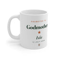 Personalised godmother mug mock-up, white mug with the handle on the left, printed 'Promoted to Godmother' and 'Isla'