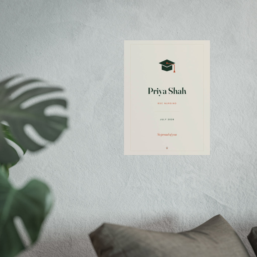Personalised graduation print mock-up at the larger size on a pale wall above a sofa beside a monstera plant