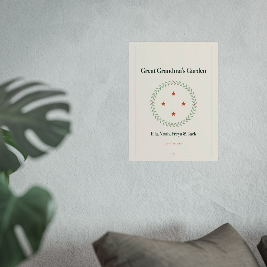 Great Grandma's Garden print mock-up hung on a pale wall beside a monstera plant and a grey sofa, shown at the larger size