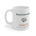 Personalised keen caravanner mug mock-up, handle on the left, with a small caravan, 'Nanny Sue' and 'Pitch 12, Lake District'