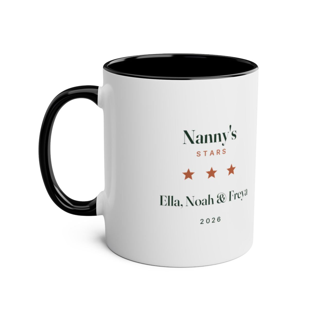 Personalised stars and names mug mock-up, black two-tone, handle on the left, with the sample 'Nanny's Stars' design
