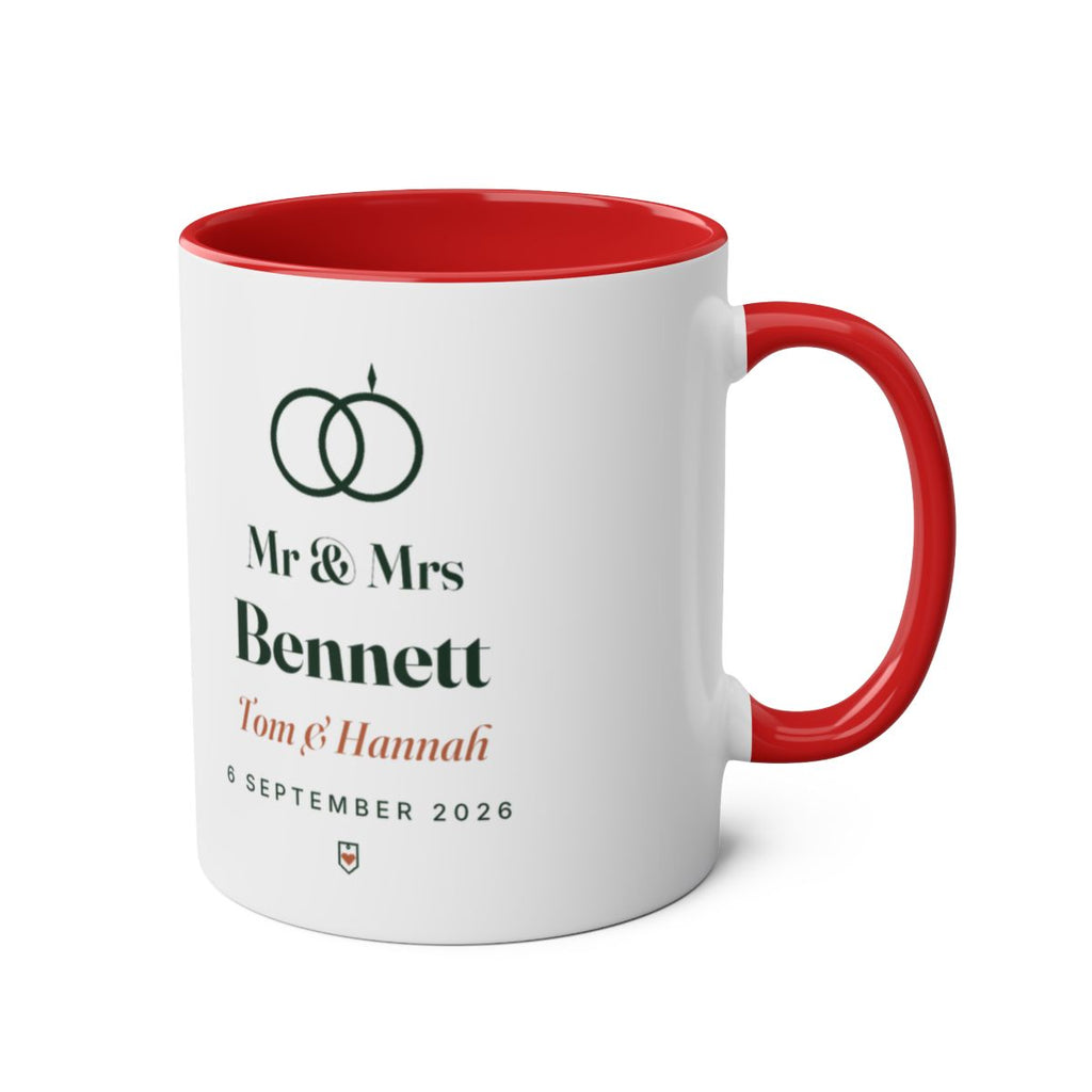 Personalised Mr & Mrs mug mock-up, red two-tone, handle on the right, with the rings motif, 'Mr & Mrs Bennett' and the date