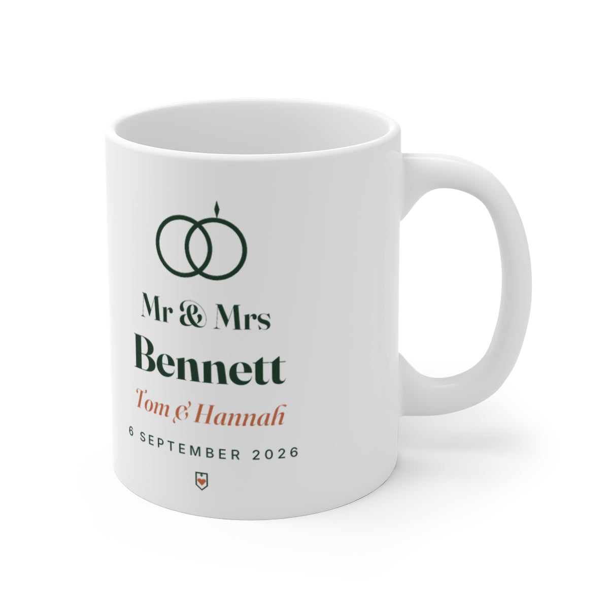 Personalised Mr & Mrs mug mock-up with the handle on the right, showing the rings motif and the sample 'Bennett' wedding text