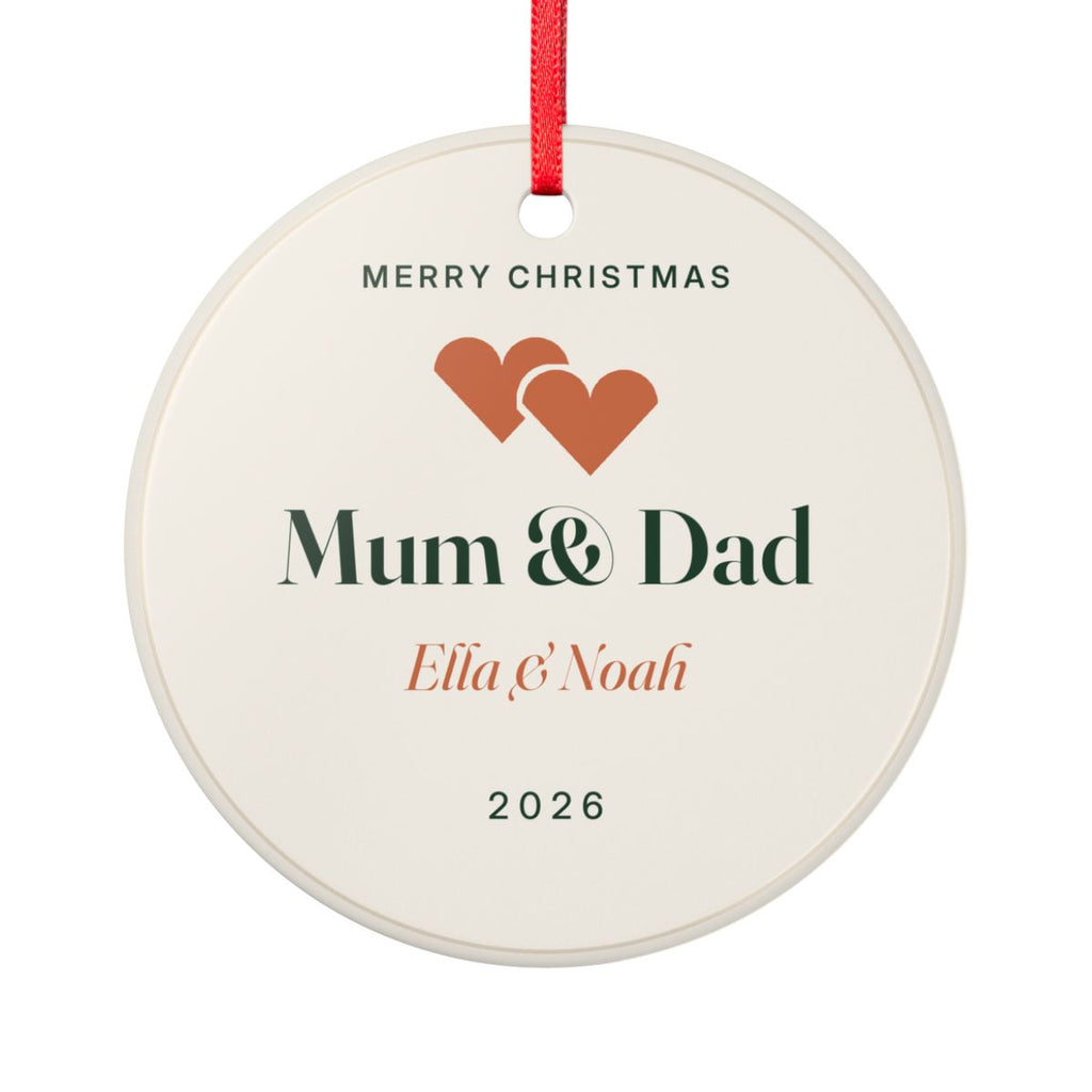 Personalised Mum and Dad Christmas ornament mock-up, round ceramic with two hearts, 'Mum & Dad', 'Ella & Noah' and '2026'