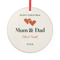 Personalised Mum and Dad Christmas ornament mock-up, round ceramic with two hearts, 'Mum & Dad', 'Ella & Noah' and '2026'