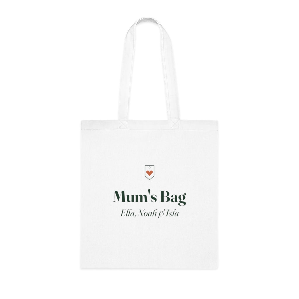 Personalised Mum's Bag tote mock-up, white cotton bag laid flat with a small heart badge, 'Mum's Bag' and 'Ella, Noah & Isla'