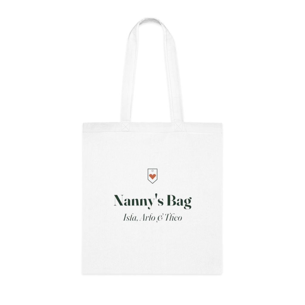 Personalised Nanny's Bag tote mock-up, white cotton bag laid flat with a heart badge, 'Nanny's Bag' and 'Isla, Arlo & Theo'