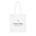 Personalised Nanny's Bag tote mock-up, white cotton bag laid flat with a heart badge, 'Nanny's Bag' and 'Isla, Arlo & Theo'