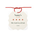 Personalised Nanny's Stars ornament mock-up, scalloped square with a red cord, 'Nanny's Stars', four stars and '2026'