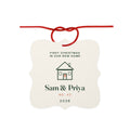 Personalised new home aluminium ornament mock-up, square with a red cord, a house outline, 'Sam & Priya' and 'No. 42'