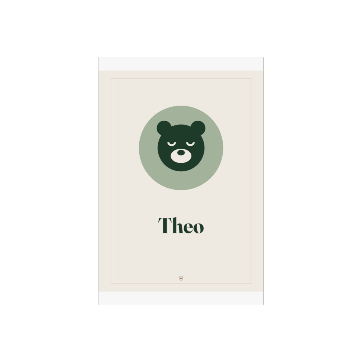 Nursery name print mock-up, unframed, a cream background with a thin border, green bear face and sample name 'Theo'