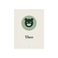 Personalised nursery name print mock-up, a sleepy bear in a sage circle with the sample name 'Theo' on a cream background