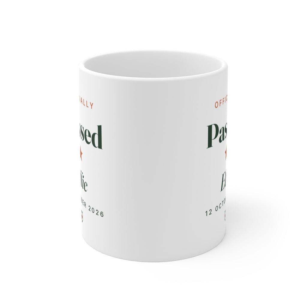 Passed driving test mug mock-up seen from the front with the handle hidden, the design visible on both sides