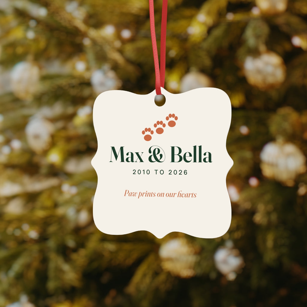 Pet memorial aluminium ornament mock-up hanging on a red ribbon in front of a decorated Christmas tree