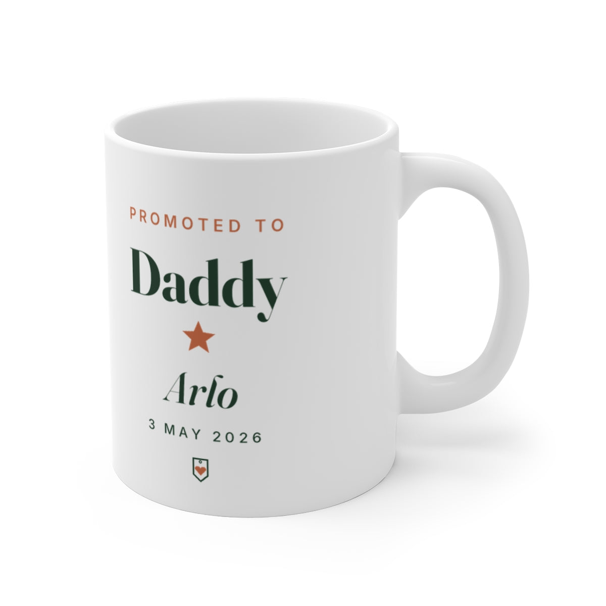 Promoted to Daddy mug mock-up with 'Arlo' and '3 May 2026' printed, handle on the right