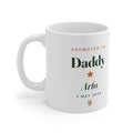 Personalised Promoted to Daddy mug mock-up with sample name 'Arlo' and '3 May 2026', handle on the left