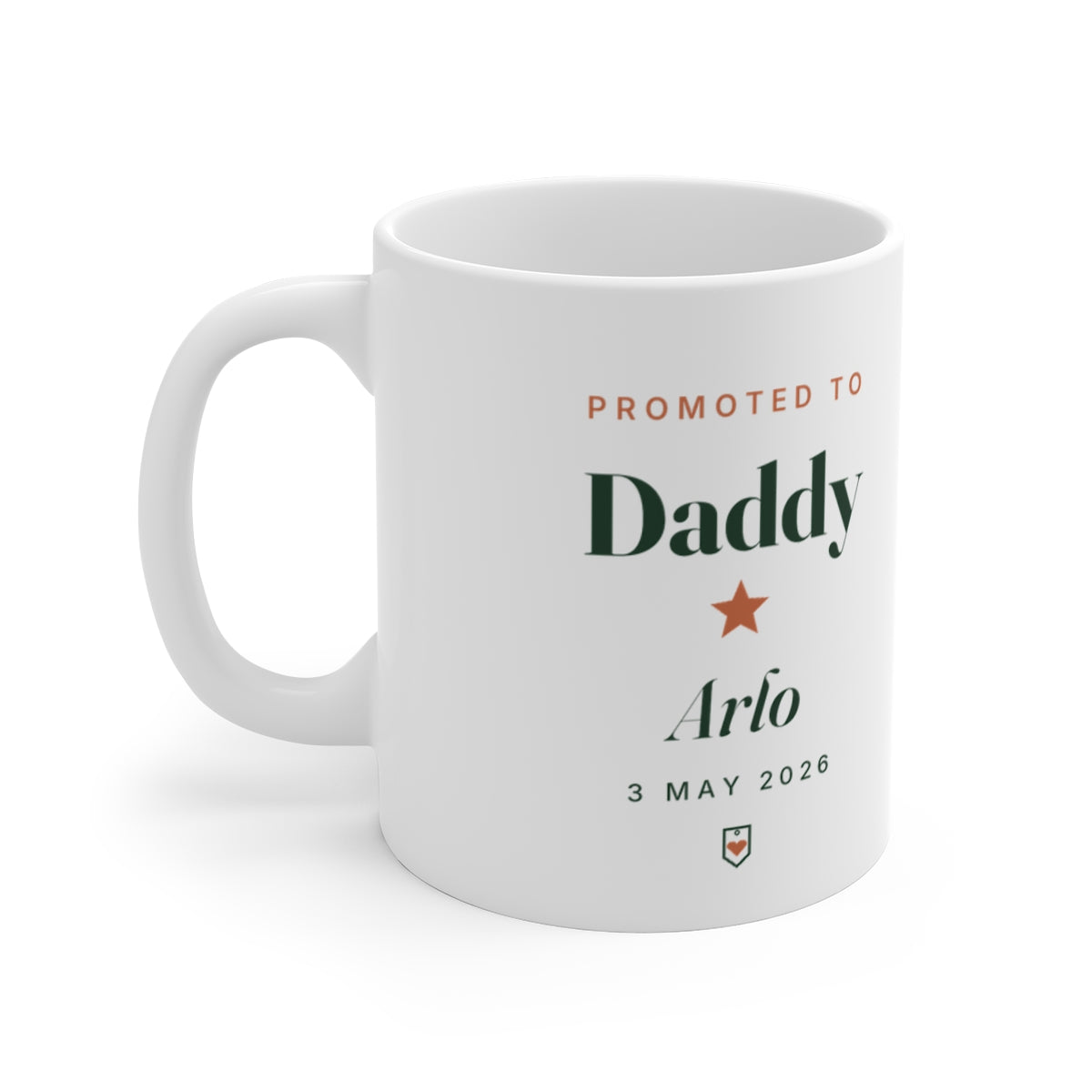 Personalised Promoted to Daddy mug mock-up with sample name 'Arlo' and '3 May 2026', handle on the left
