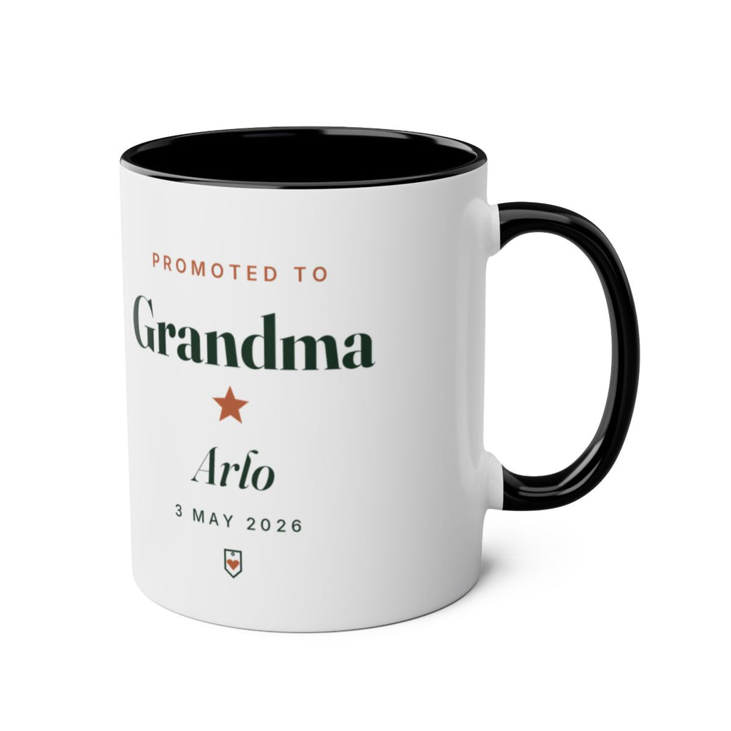 Promoted to Grandparent two-tone black mug mock-up, handle on the right, printed 'Grandma', 'Arlo' and '3 May 2026'