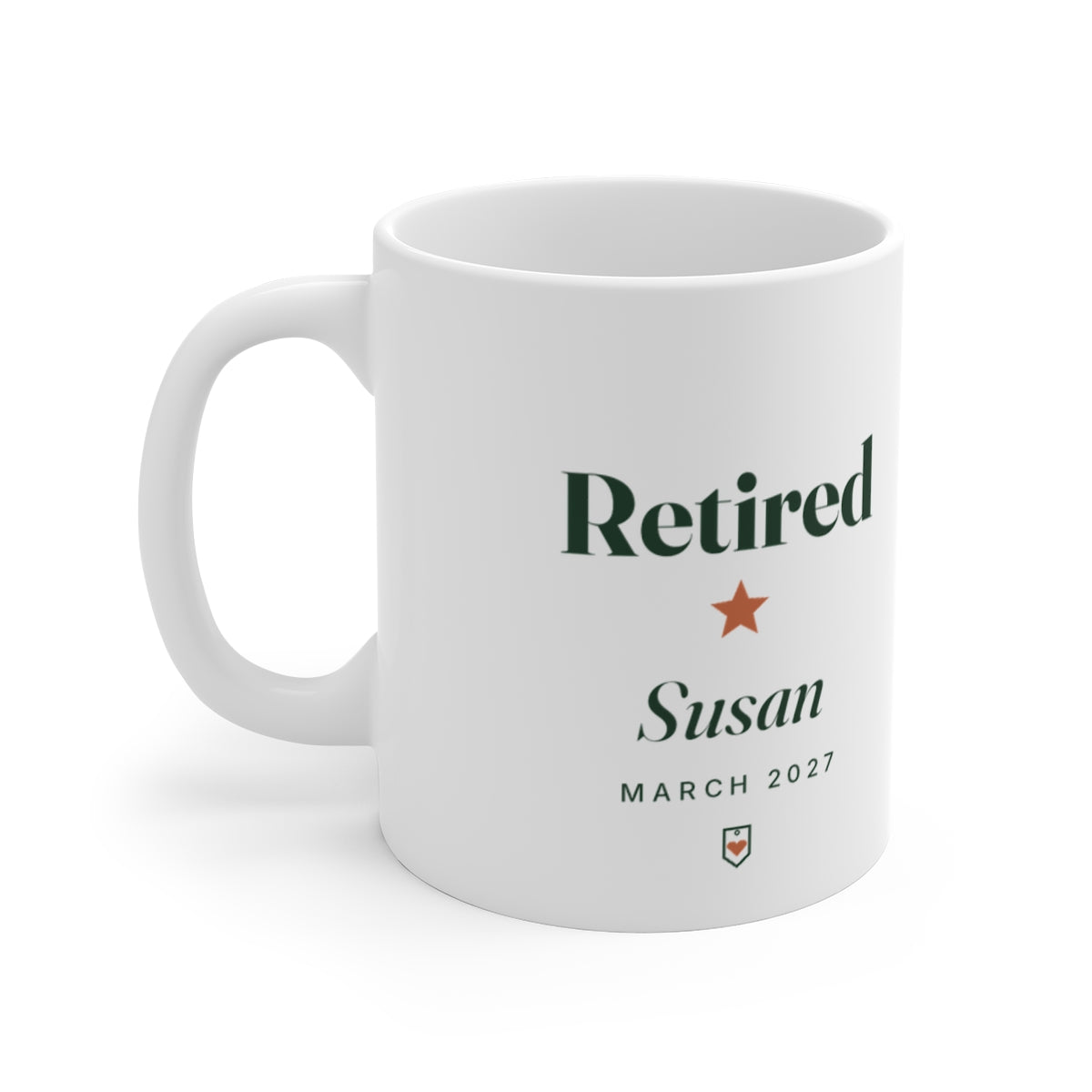 Personalised retirement mug mock-up printed 'Retired' with a star, sample name 'Susan' and 'March 2027', handle on the left
