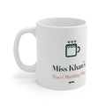Personalised teacher Christmas mug mock-up, handle on the left, a steaming mug icon, 'Miss Khan's' and 'Tea & Marking Mug'