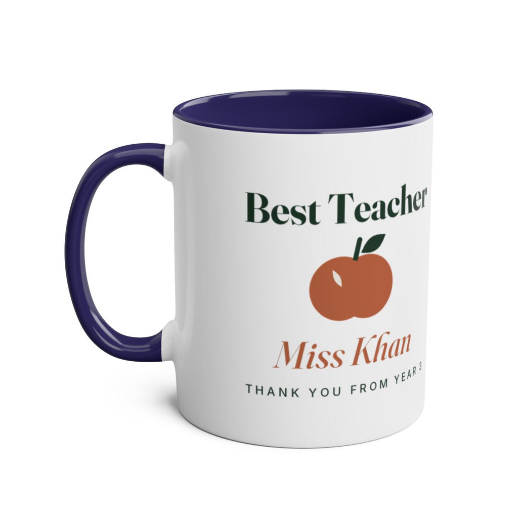 'Best Teacher' two-tone mug mock-up in dark blue, handle on the left, with the apple and sample name 'Miss Khan'