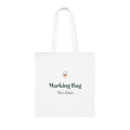 Personalised teacher tote bag mock-up, white cotton tote laid flat with a small heart tag, 'Marking Bag' and 'Miss Khan'