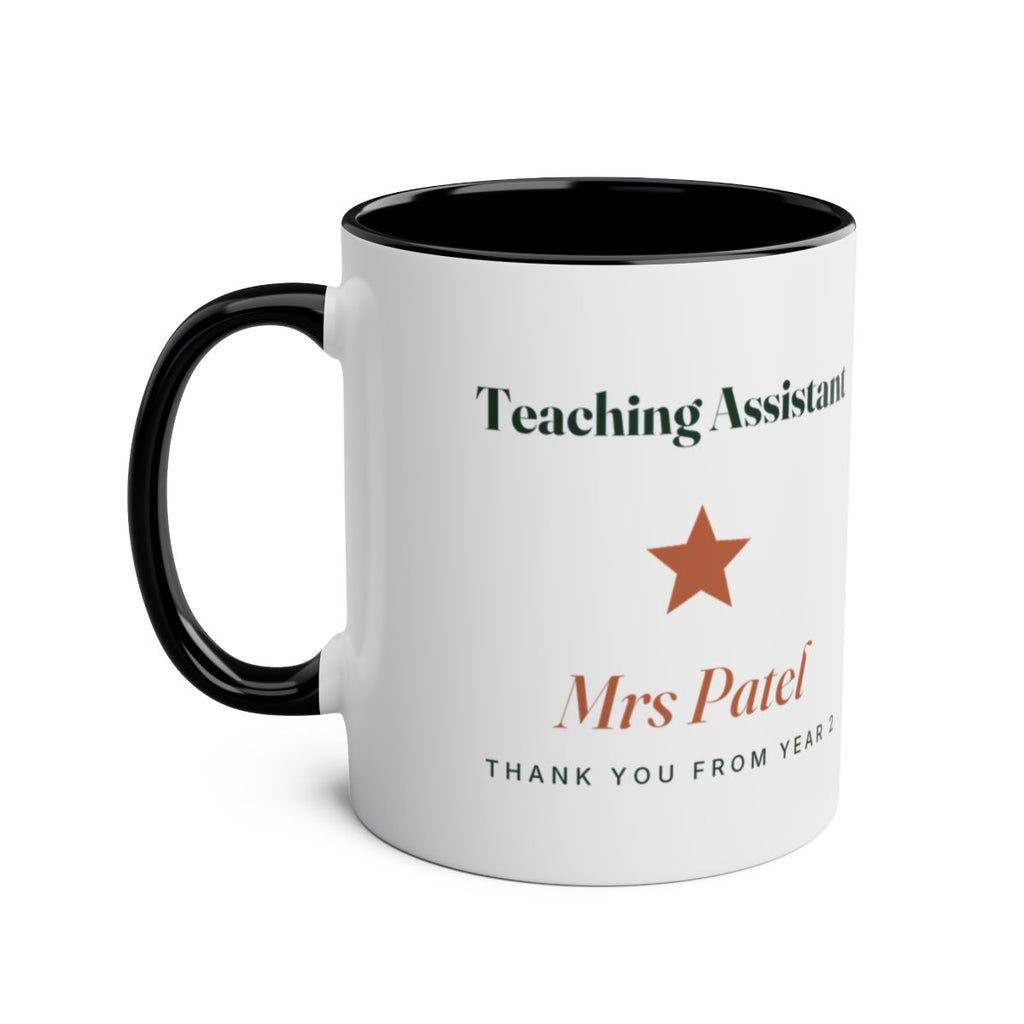Teaching Assistant two-tone mug mock-up, black, handle on the left, star, sample name 'Mrs Patel', 'Thank you from Year 2'
