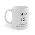 Personalised Wife mug mock-up with linked rings, sample name 'Hannah' and 'Married 6 September 2014', handle on the left