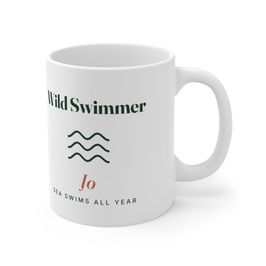 Personalised Wild Swimmer mug mock-up from the other side, handle on the right, showing the waves and 'Jo' print in full