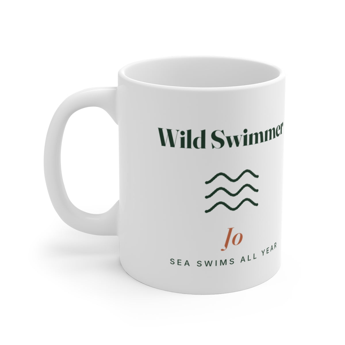 Personalised Wild Swimmer mug mock-up with three wavy lines, sample name 'Jo' and 'Sea swims all year', handle on the left